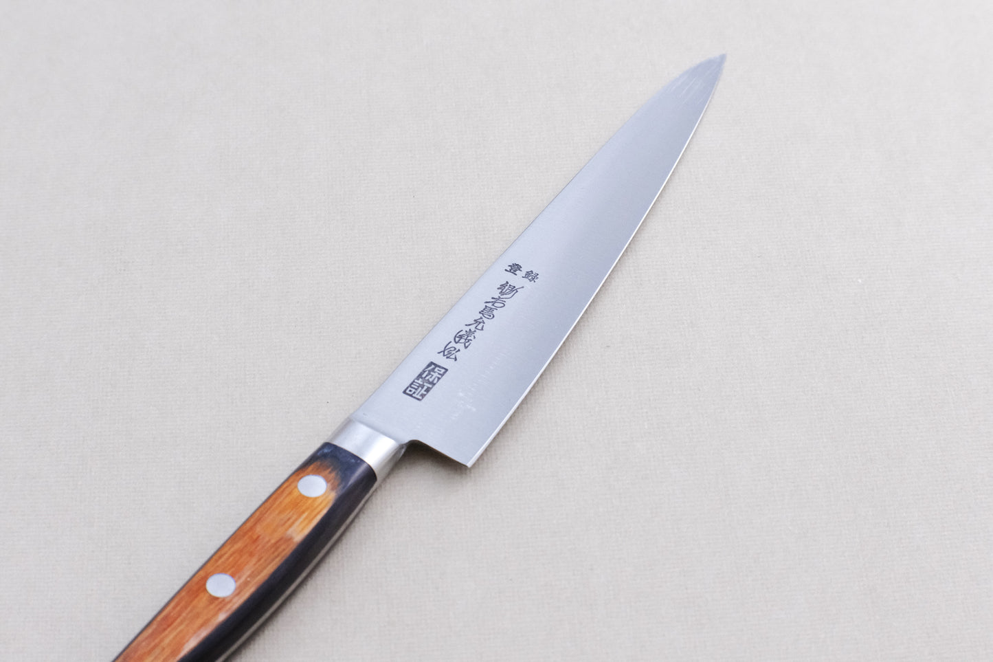 Yoshihiro HGB SK4 petty 150 met pakka handvat