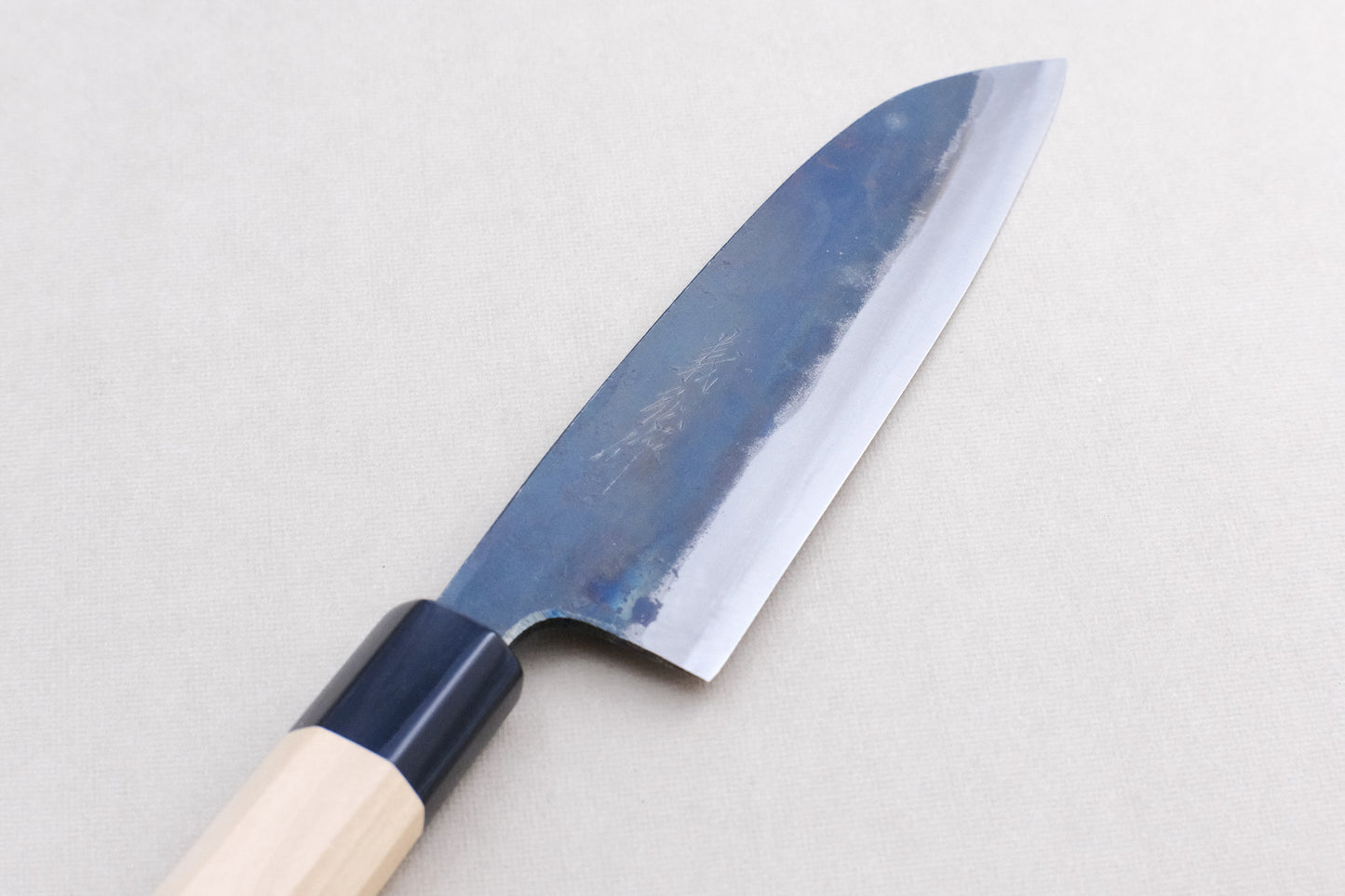 Yoshihiro RGB blue 2 kurouchi santoku 165 with an octagonal ho wood and buffalo horn handle