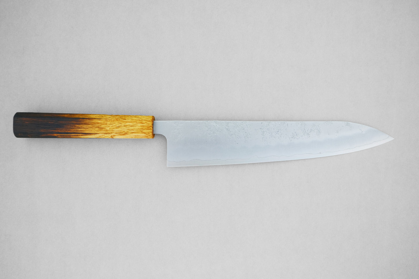 Yoshihiro ginsan nashiji gyuto 240 with a burnt lacquered octagonal oak handle