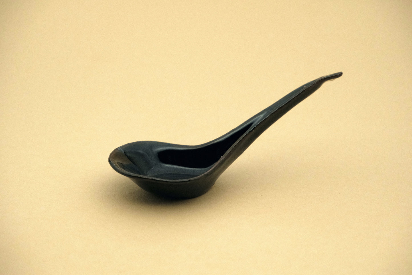 Azmaya Igayaki renge soup spoon with a black glaze made at the Kōbō kiln in Mie