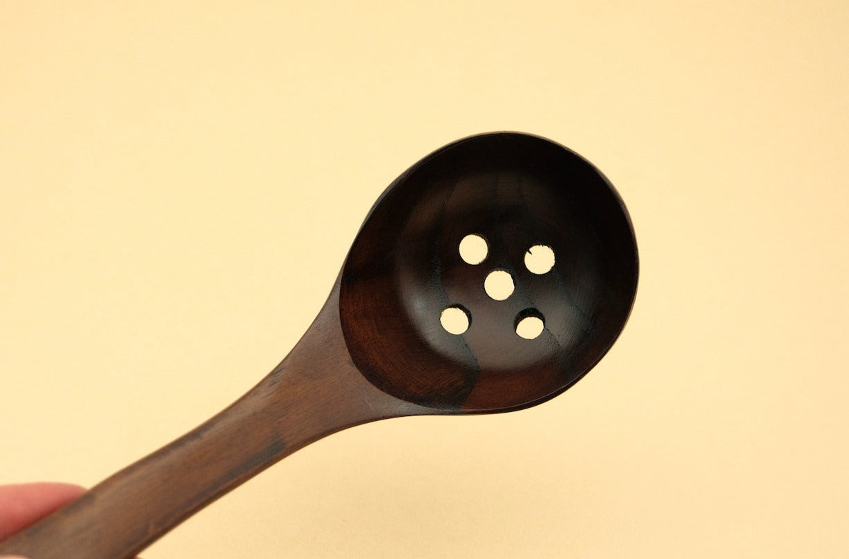 Wood ladle slotted