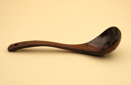 Wood ladle slotted