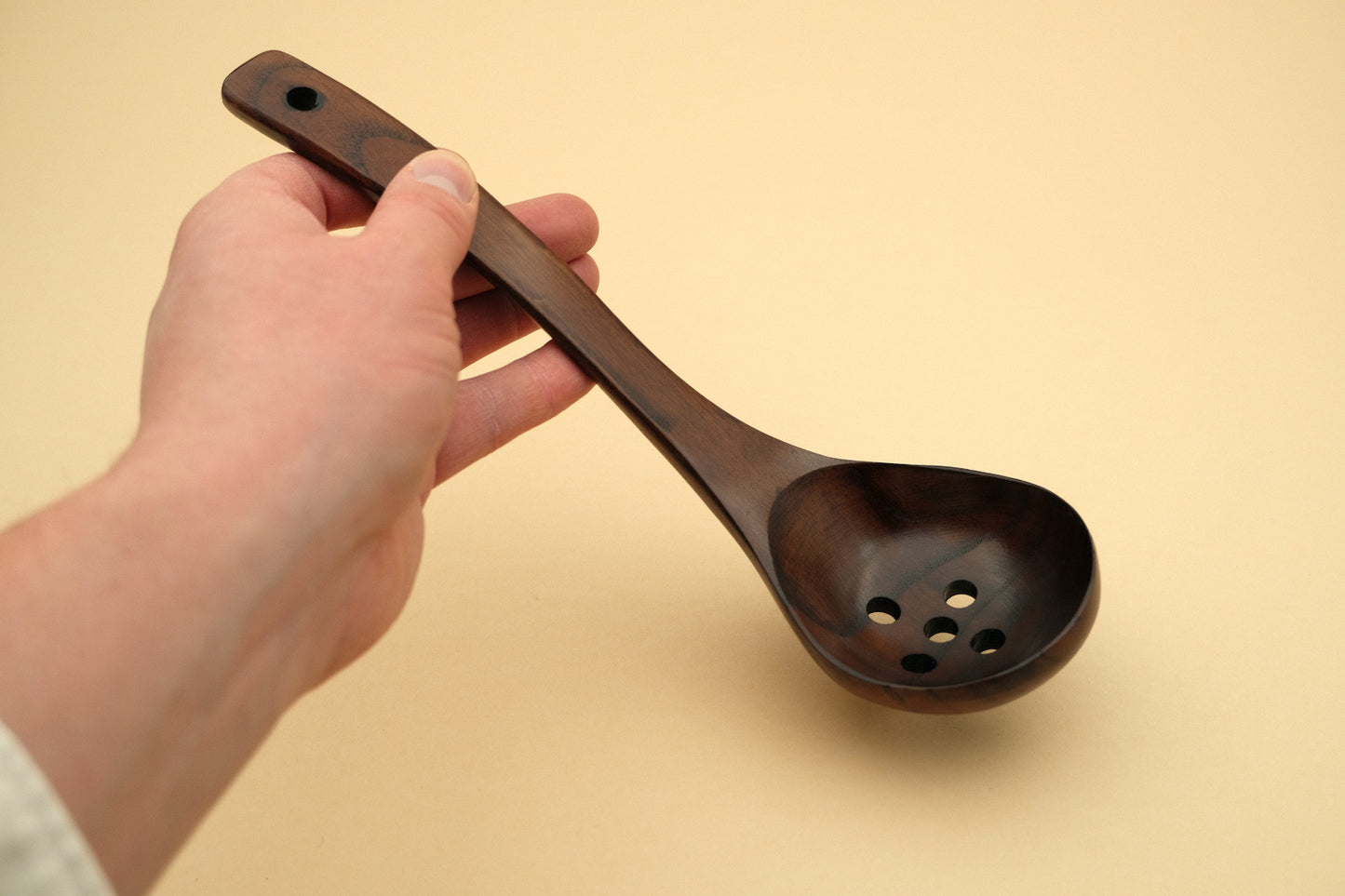 Wood ladle slotted