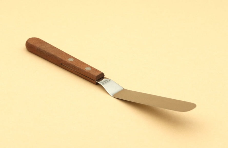 Offset spatula for plating