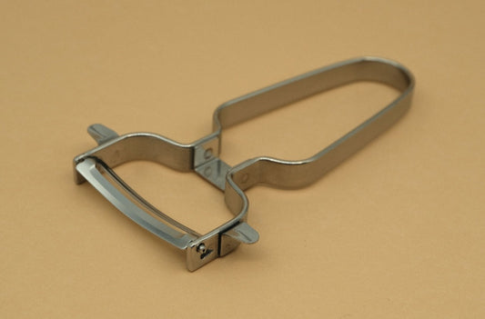 Stainless steel vegetable peeler