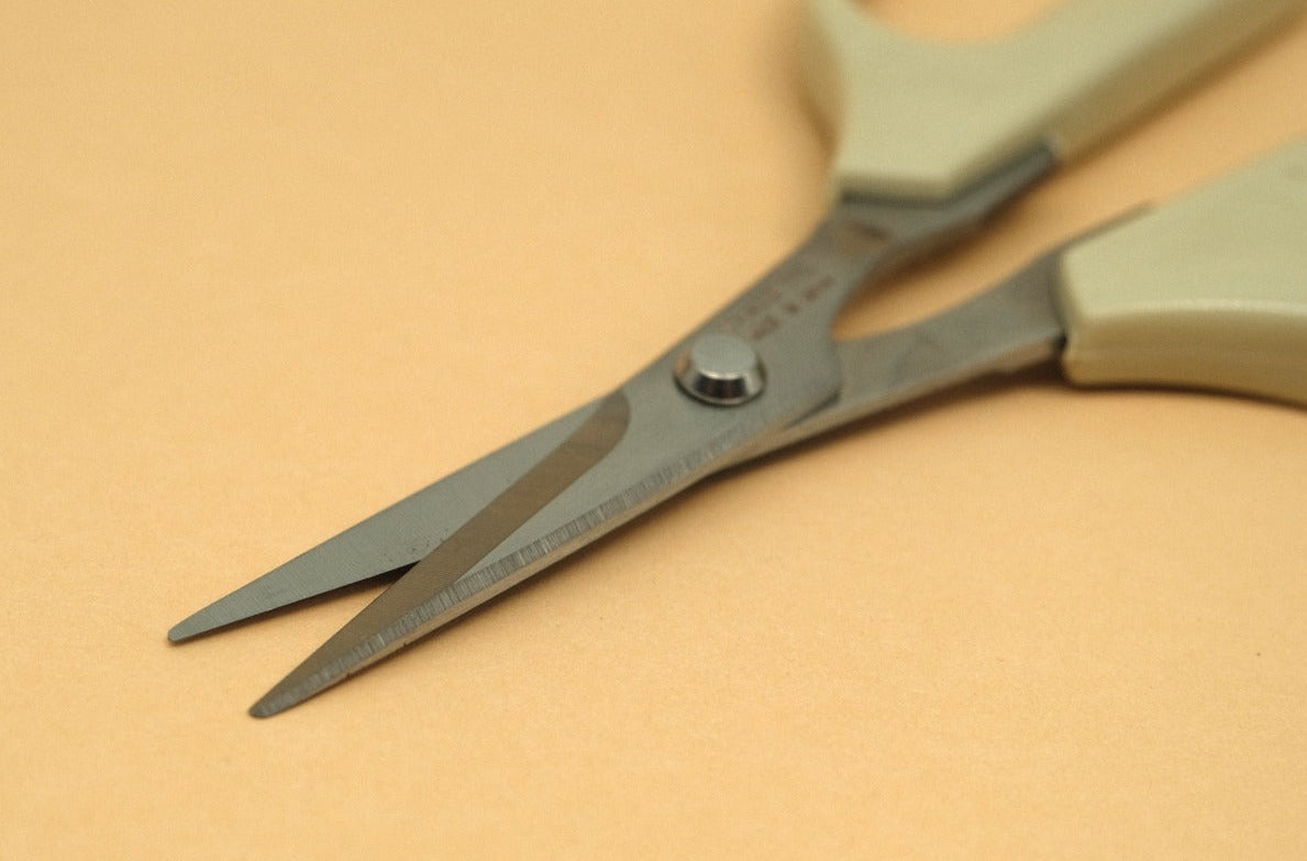 Stainless steel kitchen snips with a plastic handle