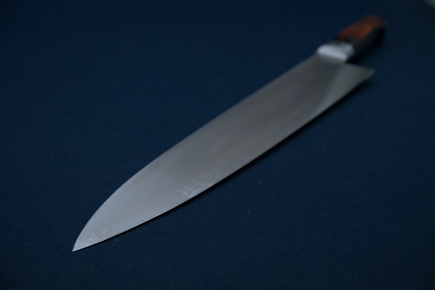 Yoshihiro HGB SK4 gyuto 240 with a pakka handle