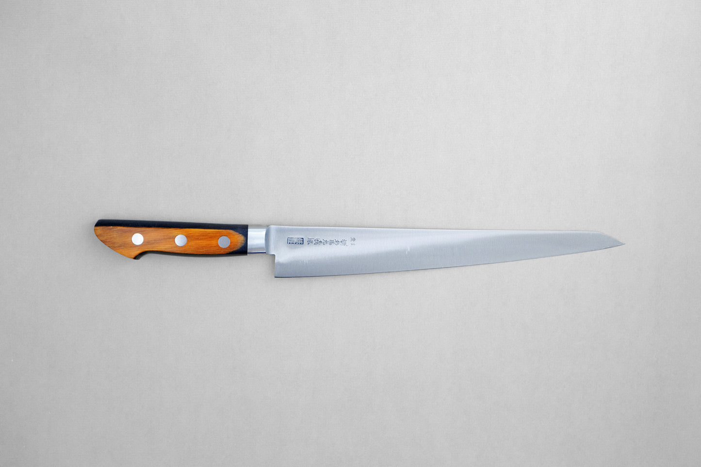 Yoshihiro HGB SK4 sujihiki 240 with a pakka handle