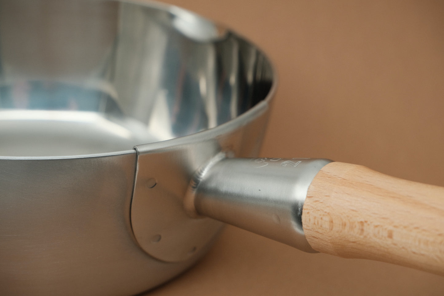 Yukihira sauce pan made of 3ply stainless steel with a wooden handle